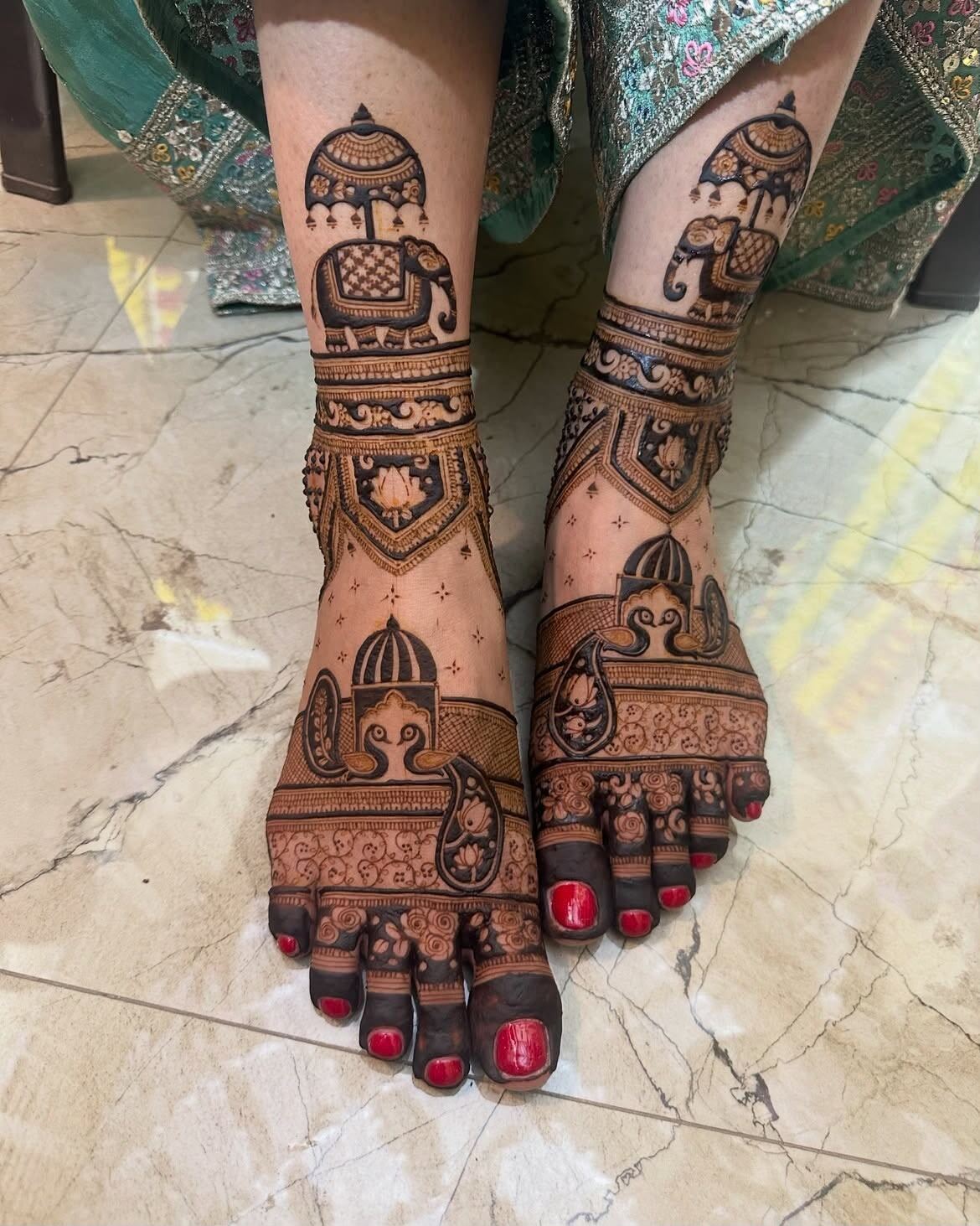 Bridal feet mehndi elephant umbrella design